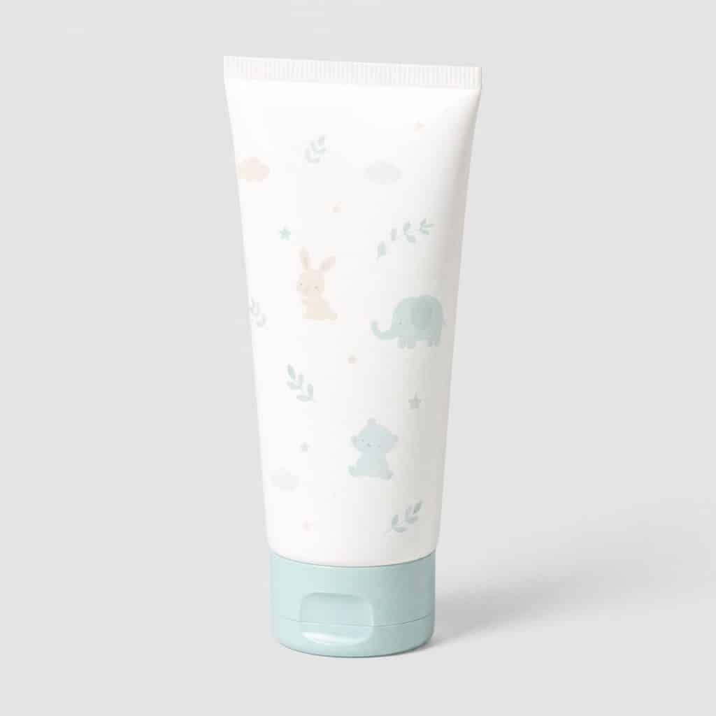 Tube de crème hydratante pour bébé sur fond neutre