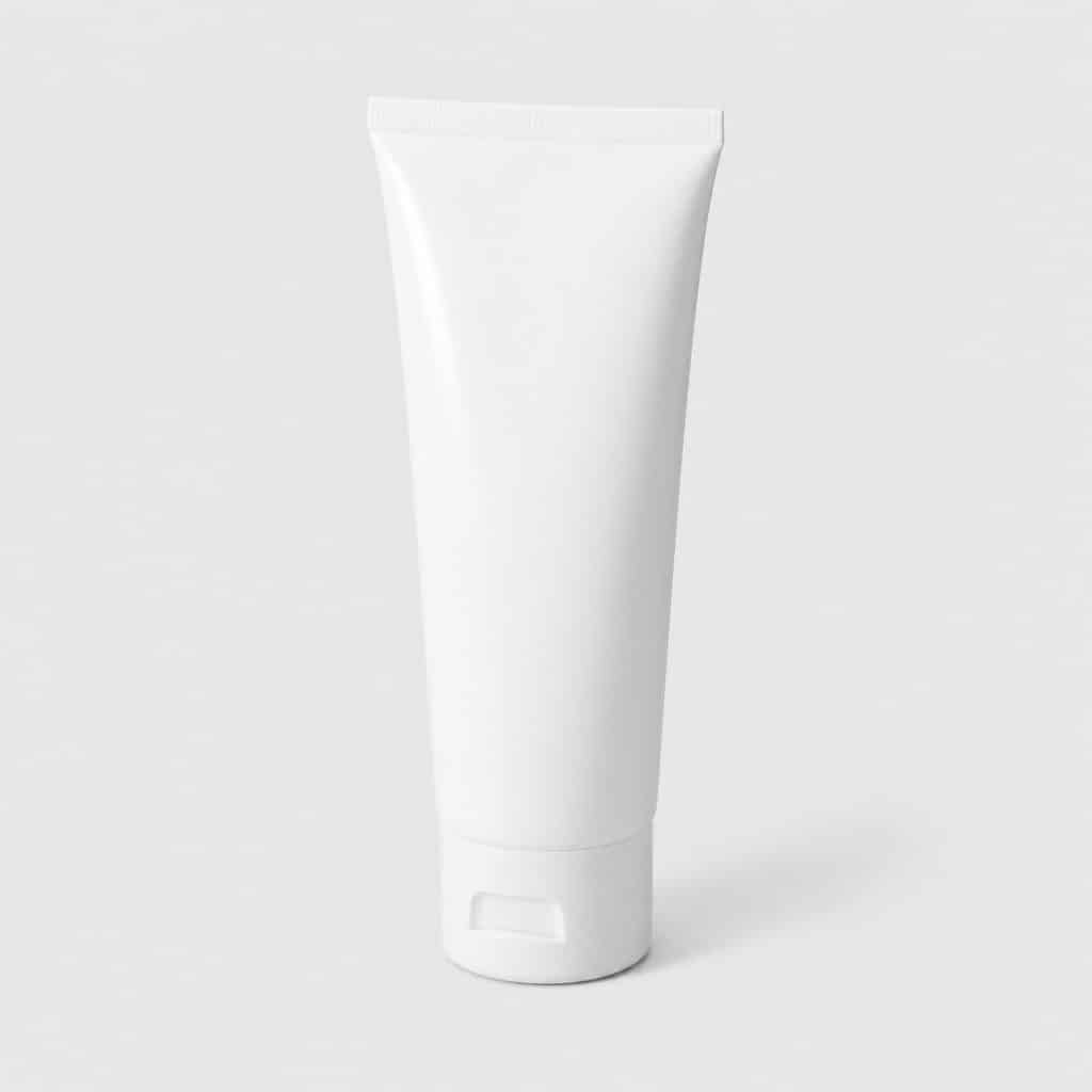 Tube de crème apaisante pour peaux sensibles sur fond neutre