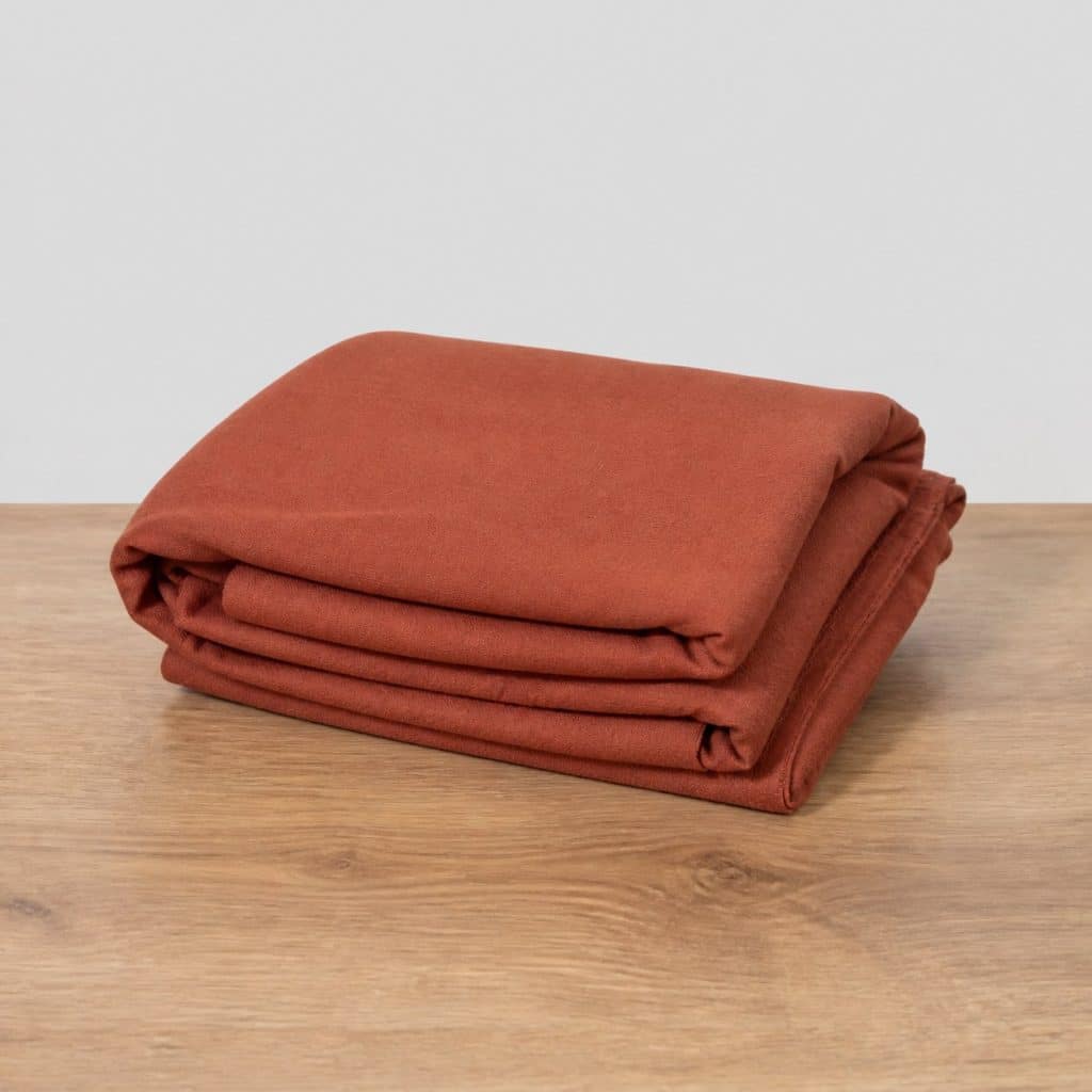Écharpe de portage courte terracotta pliée