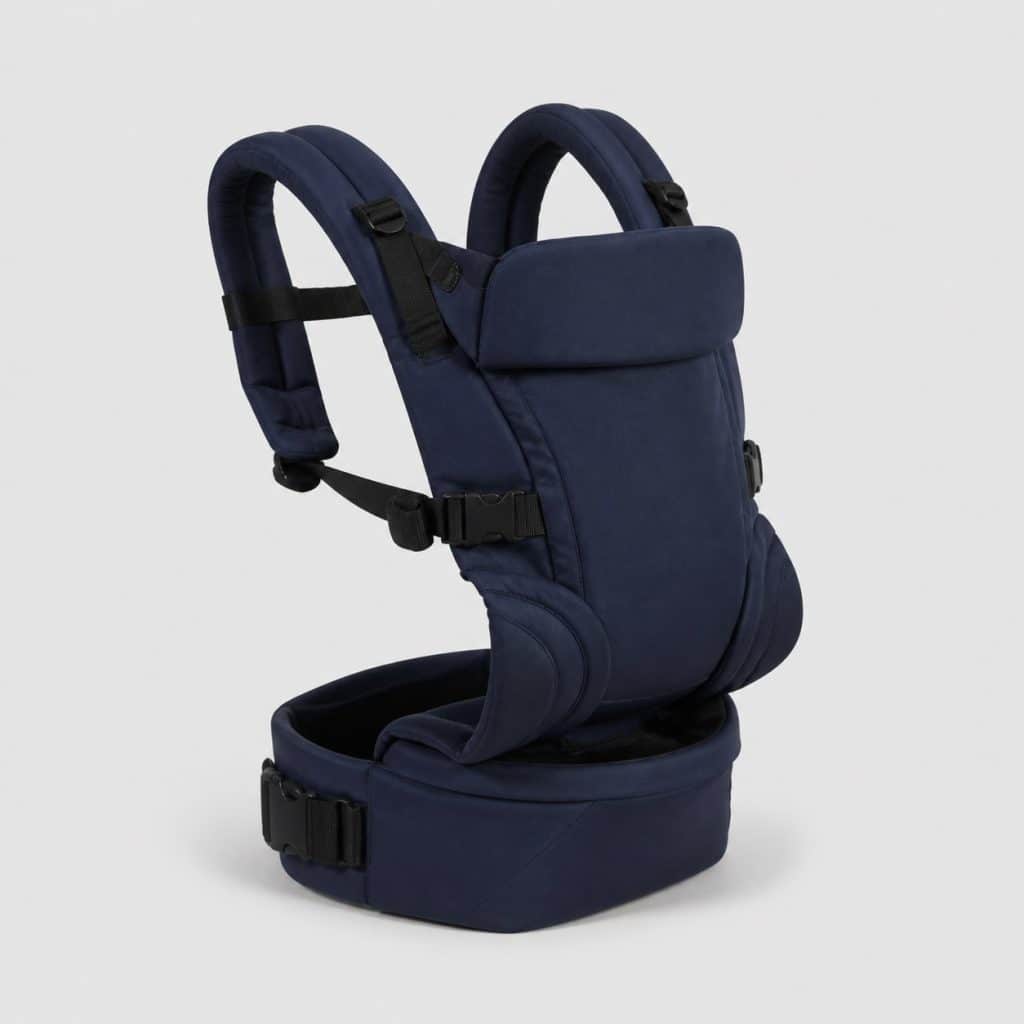Porte-bébé physiologique bleu marine avec assise intégrée posé à plat