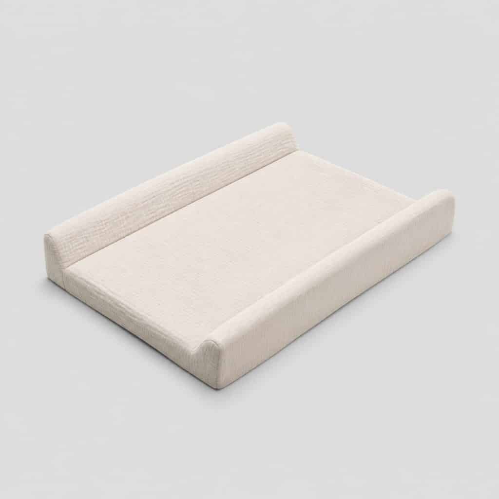 Matelas à langer avec rebords surélevés vu de dessus