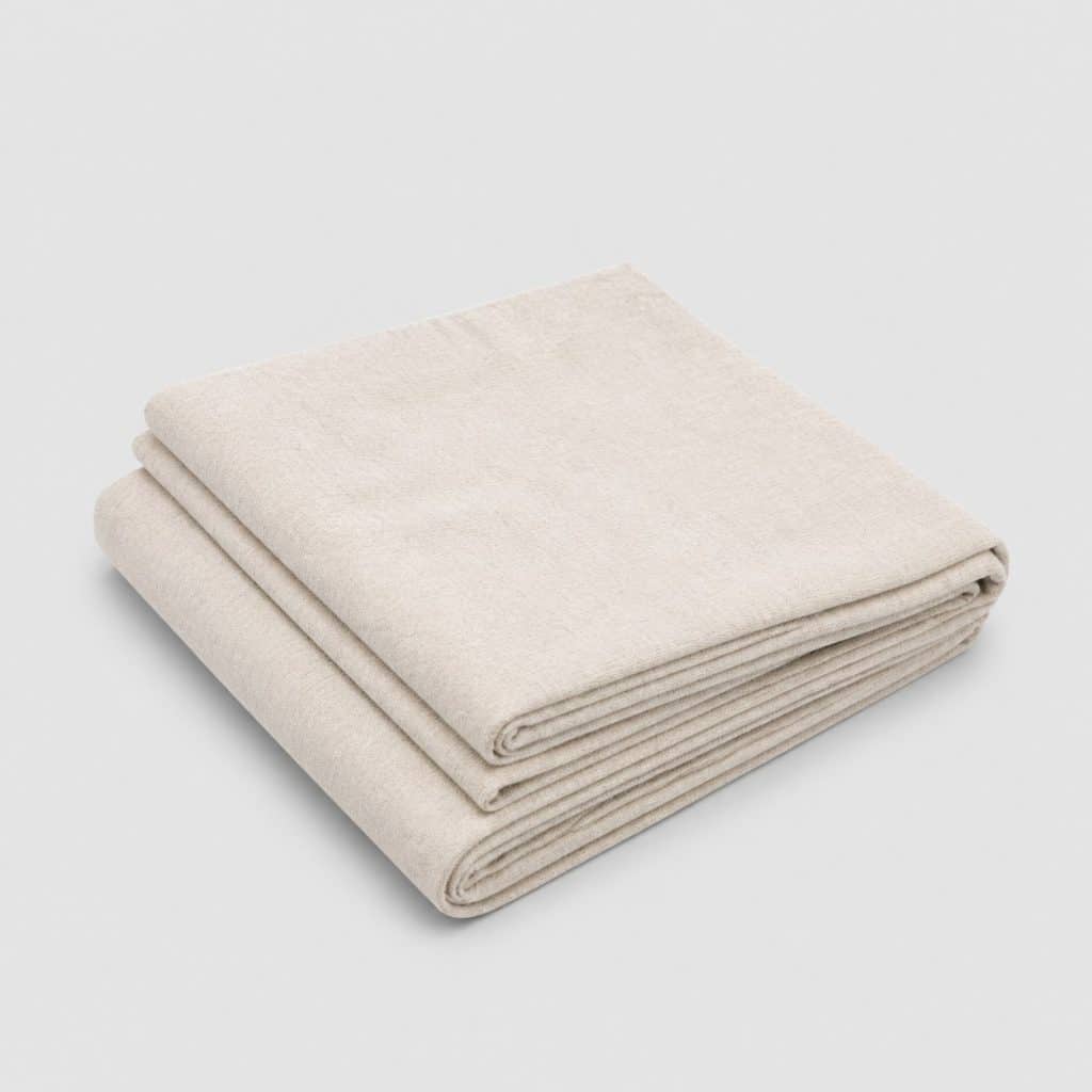 Écharpe de portage en coton écru chiné pliée
